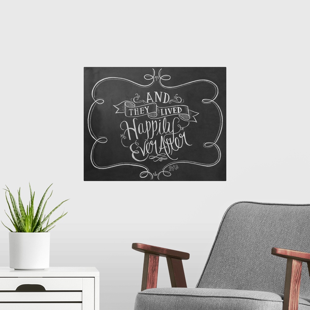 A modern room featuring "And they lived happily ever after" handwritten in white chalk on a black background.