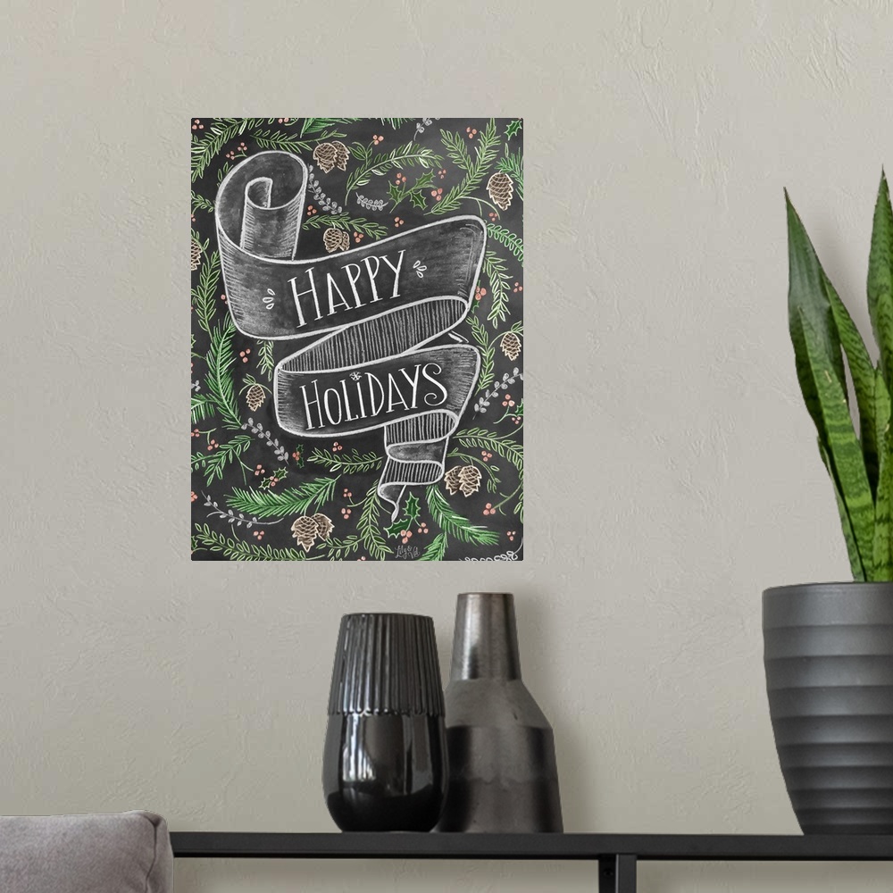 A modern room featuring "Happy Holidays" handwritten on a banner and surrounded by pinecones and branches.