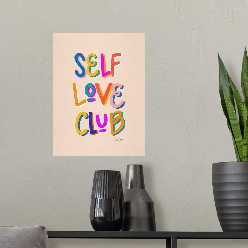 A modern room featuring Rainbow Self Love Club