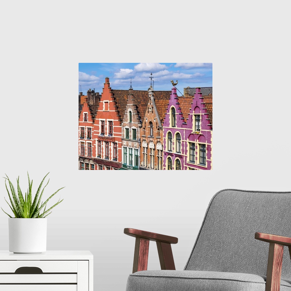 A modern room featuring Belgium, West Flanders (Vlaanderen), Bruges (Brugge). Medieval guild houses on Markt square.