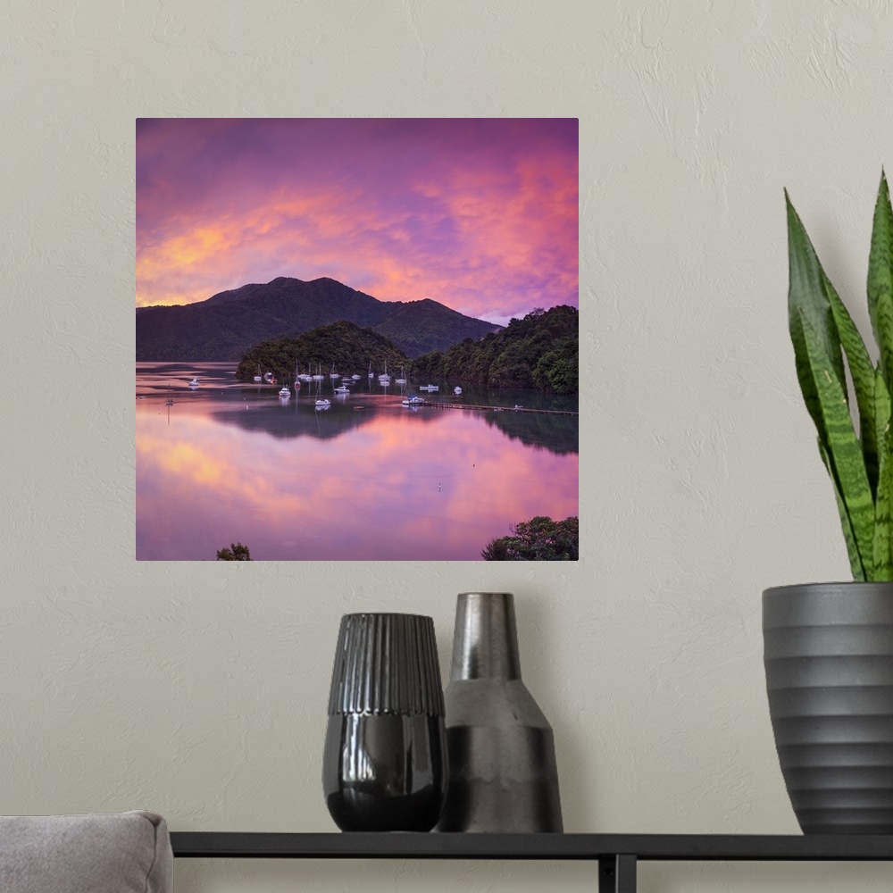 A modern room featuring Sunset illuminates the picturesque Ngakuta Bay, Queen Charlotte Sound, Marlborough Sounds, South ...