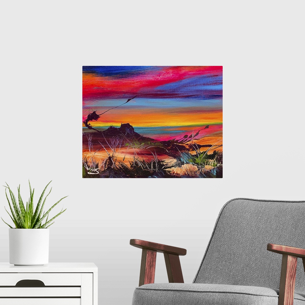 A modern room featuring Contemporary painting using a wide range of color of a desert landscape under sunset sky.