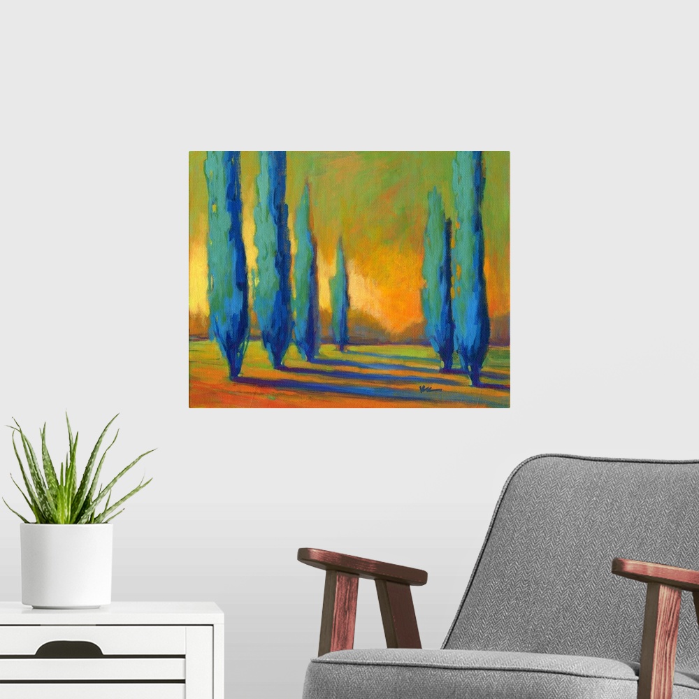 A modern room featuring A contemporary painting of a divide between a row of cypress trees in golden colors.