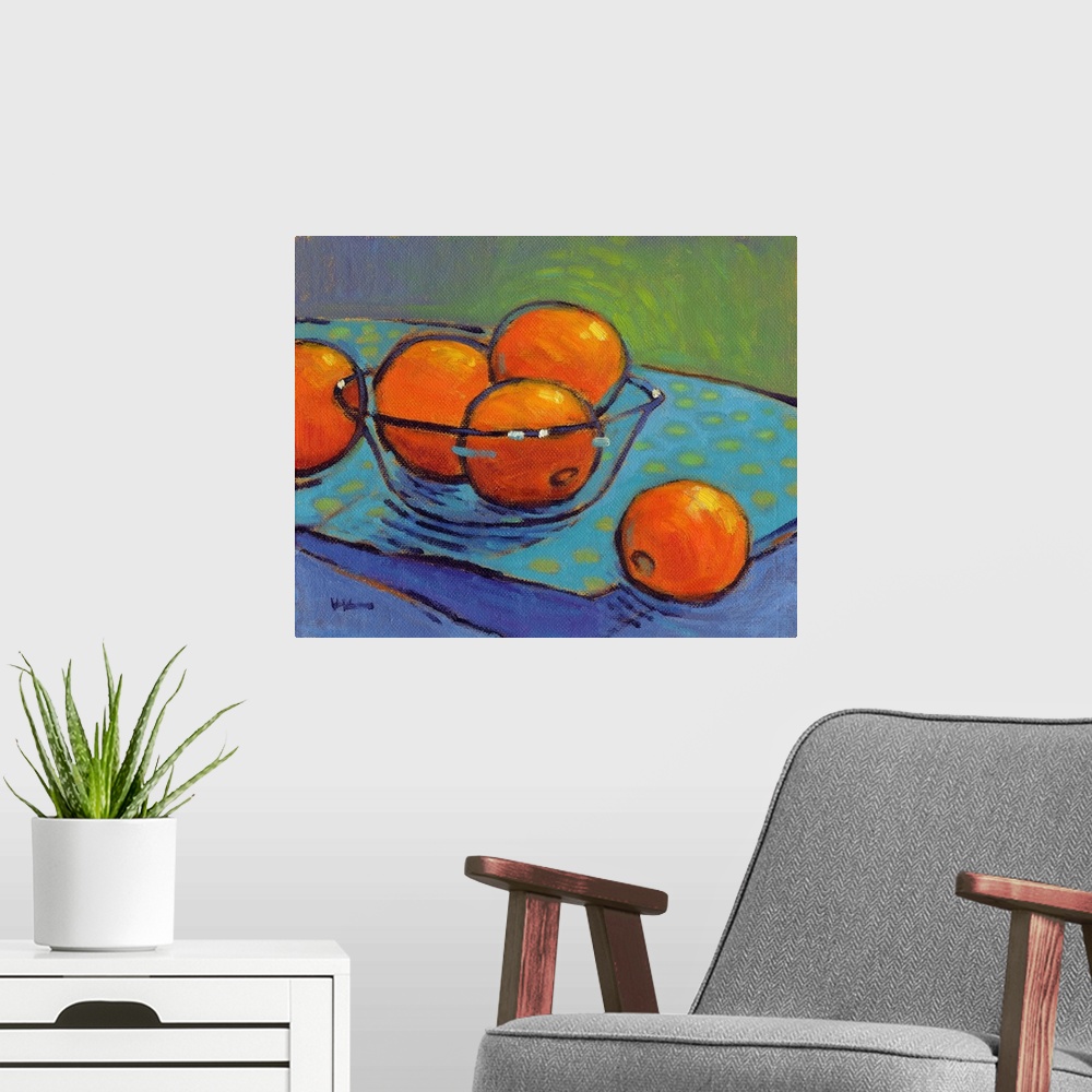 A modern room featuring A contemporary abstract painting of a bowl of oranges in vibrant colors.