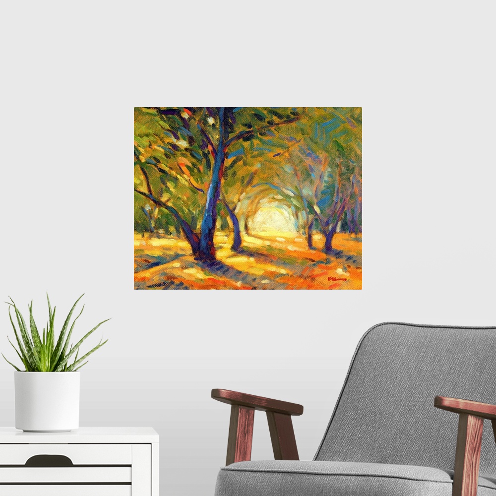A modern room featuring A horizontal contemporary painting of colorful autumn forest.