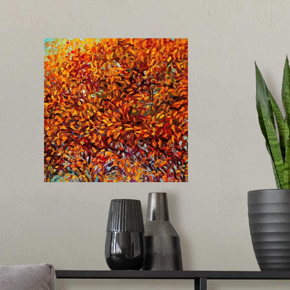 A modern room featuring Brightly colored contemporary artwork of a road with fall colored trees.