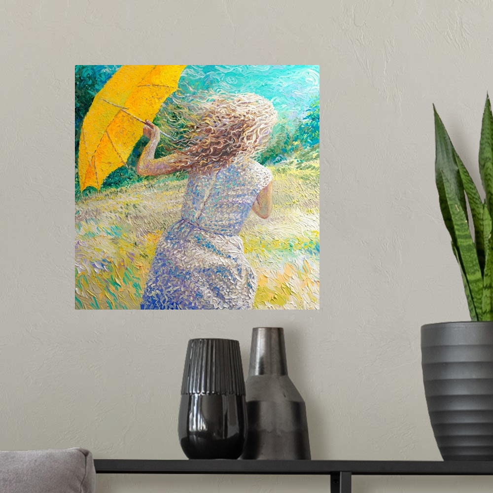 A modern room featuring Brightly colored contemporary artwork of a woman in a windy field.