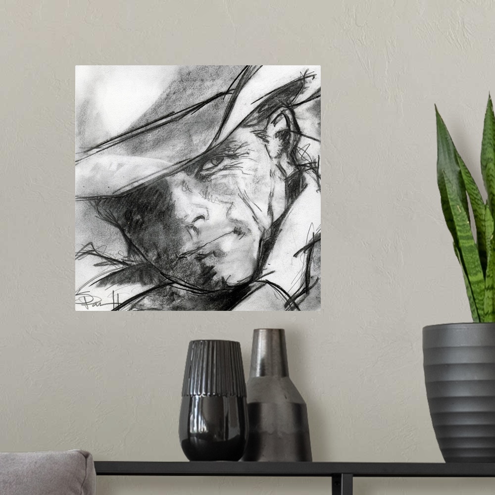 A modern room featuring Black and white sketch of a cowboy's face.