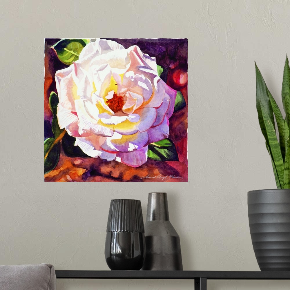 A modern room featuring Painting of a rose with light shining on its petals.