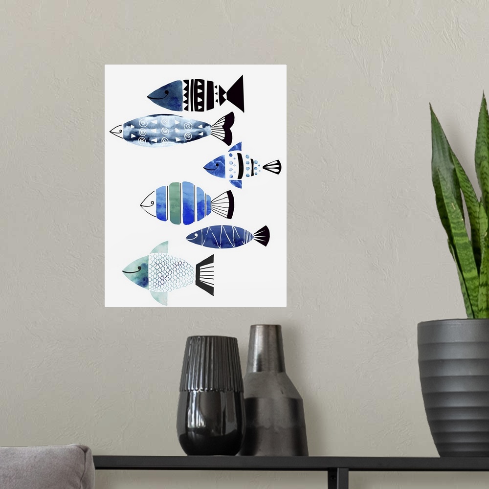 A modern room featuring A modern watercolor design of a group of fish in different patterned colors of blue and green.