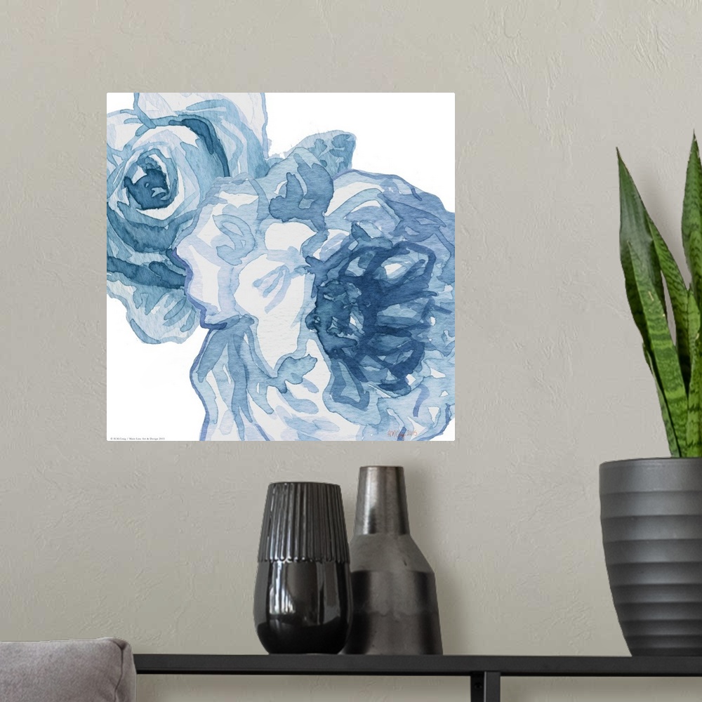 A modern room featuring Watercolor painting of two flowers in shades of blue.