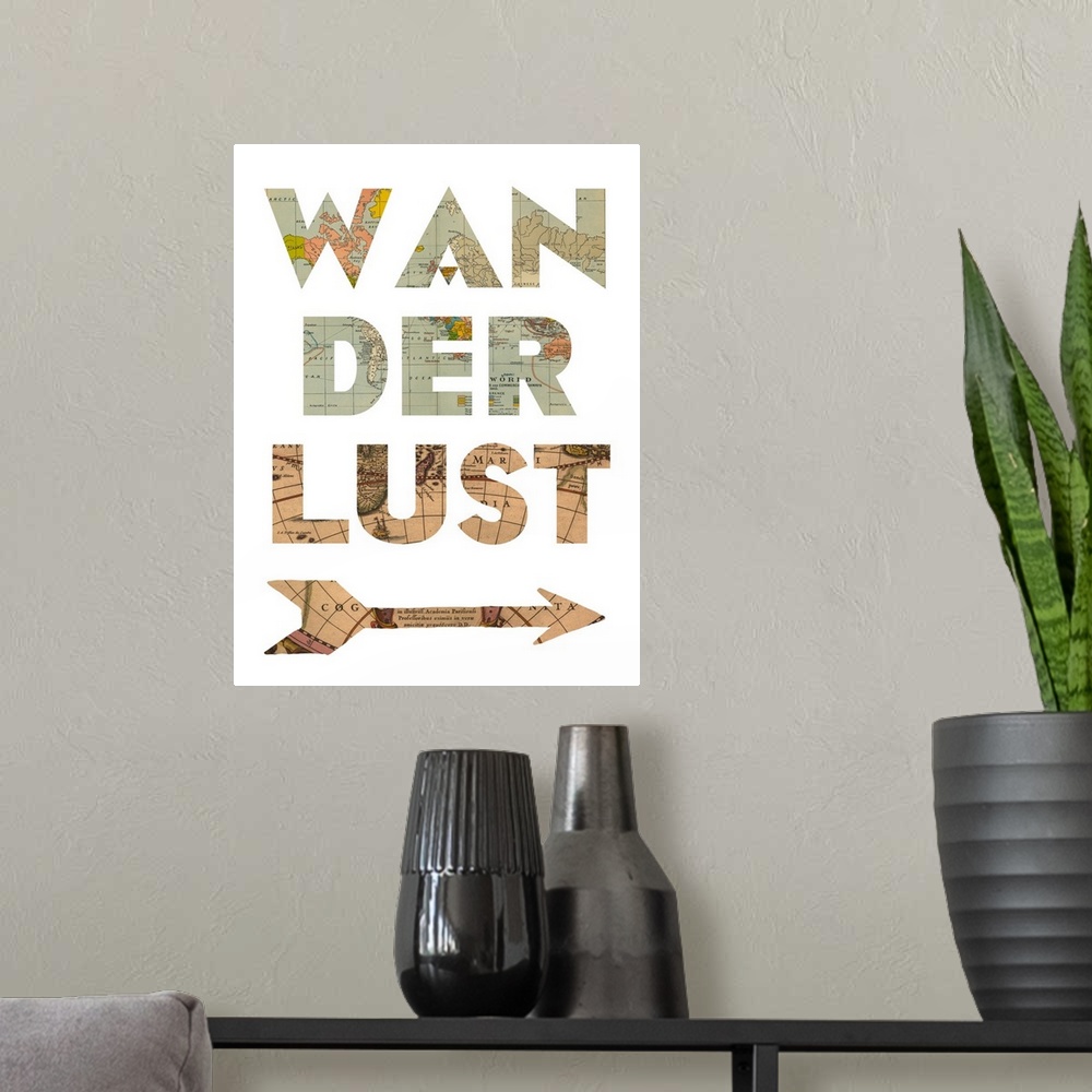 A modern room featuring The word "wanderlust" and an arrow shape made from a vintage map.