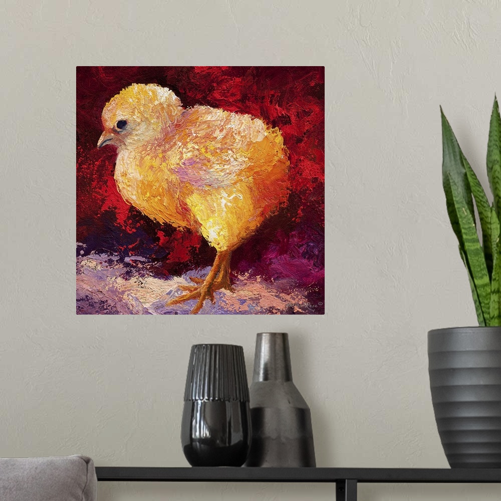 A modern room featuring Brightly colored painting of a newborn chick with vibrant red and orange tones.