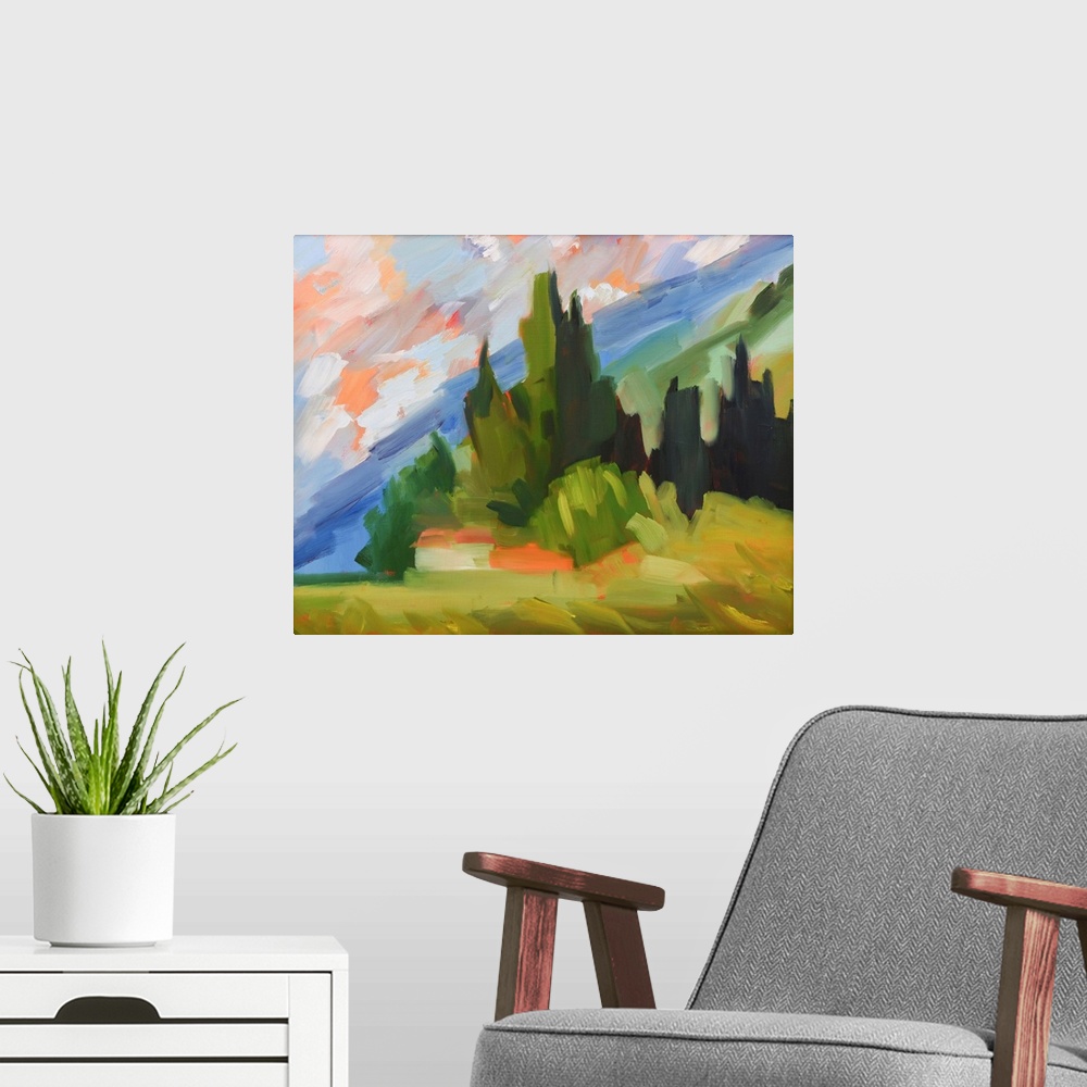 A modern room featuring Hillside scene in Tuscany with colorful sky and trees.