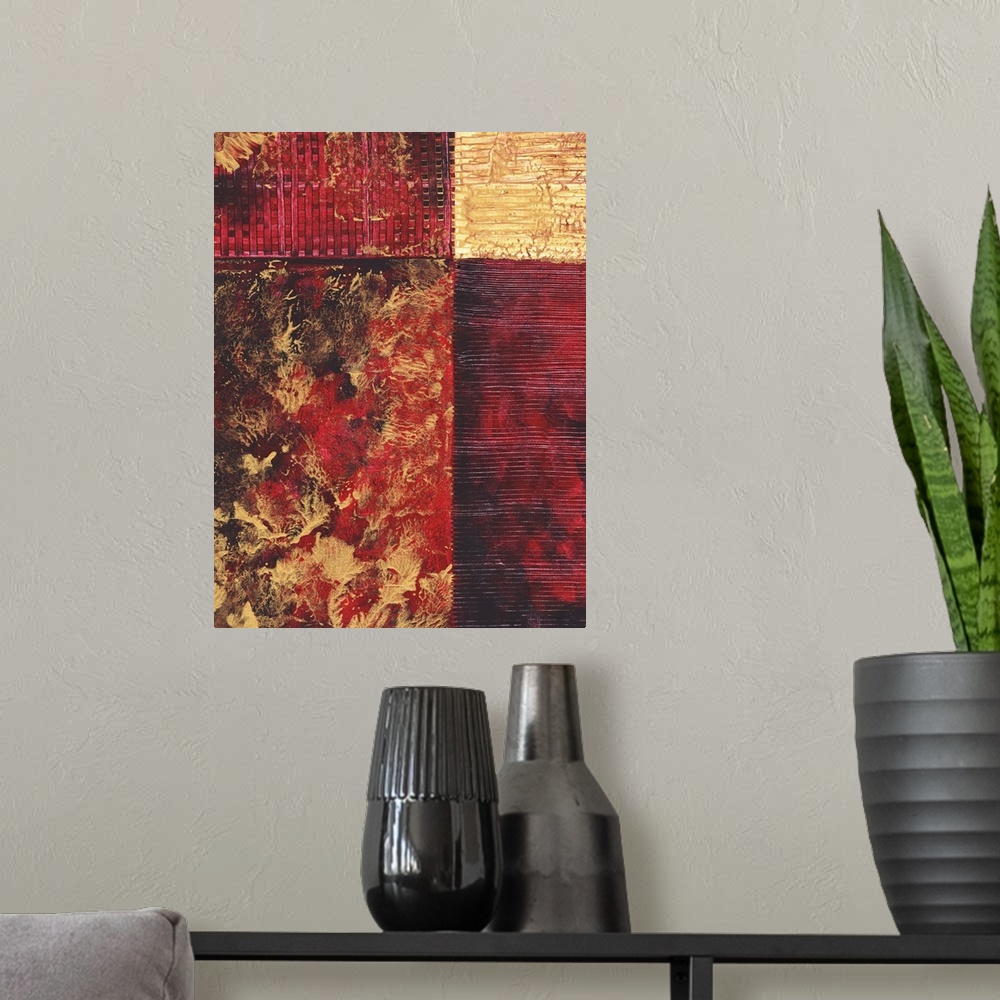 A modern room featuring Contemporary abstract painting using gold and red tones in geometric forms.