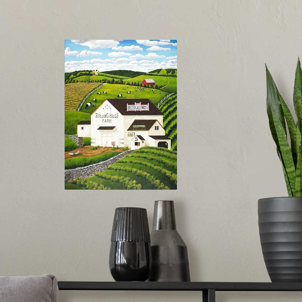A modern room featuring Americana scene of a white barn with Belted Galloway cows.