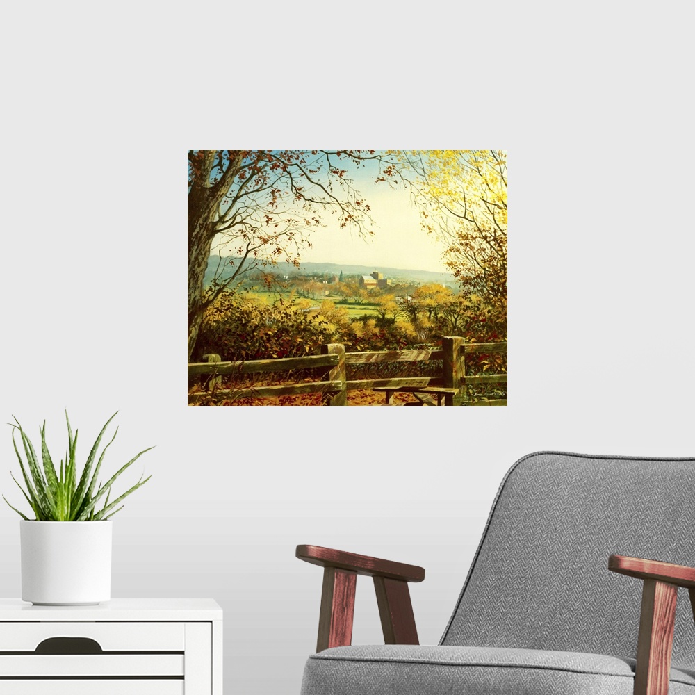 A modern room featuring Idyllic painting of a rural landscape, with a village in the distance.