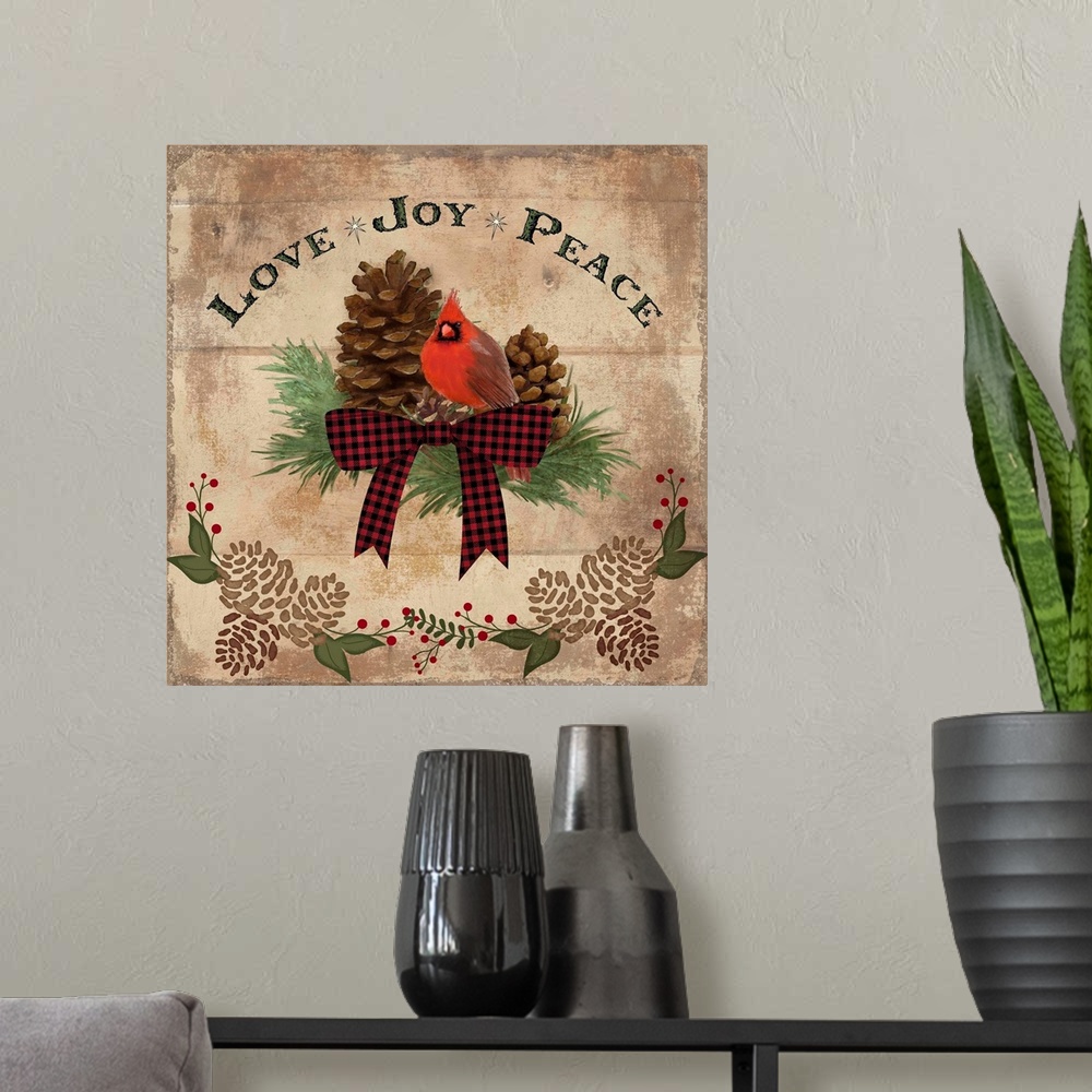 A modern room featuring Christmas decor of a cardinal with pinecones and a festive bow.