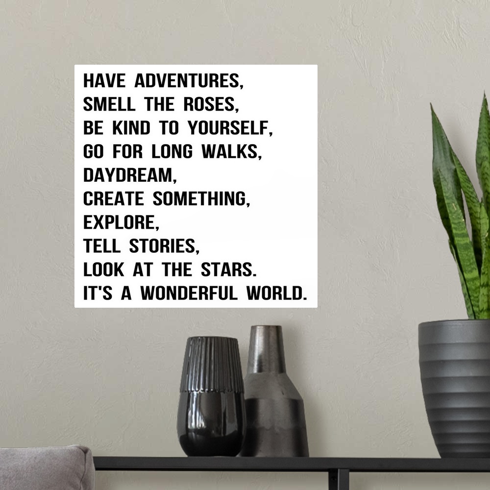 A modern room featuring Have Adventures, black on white