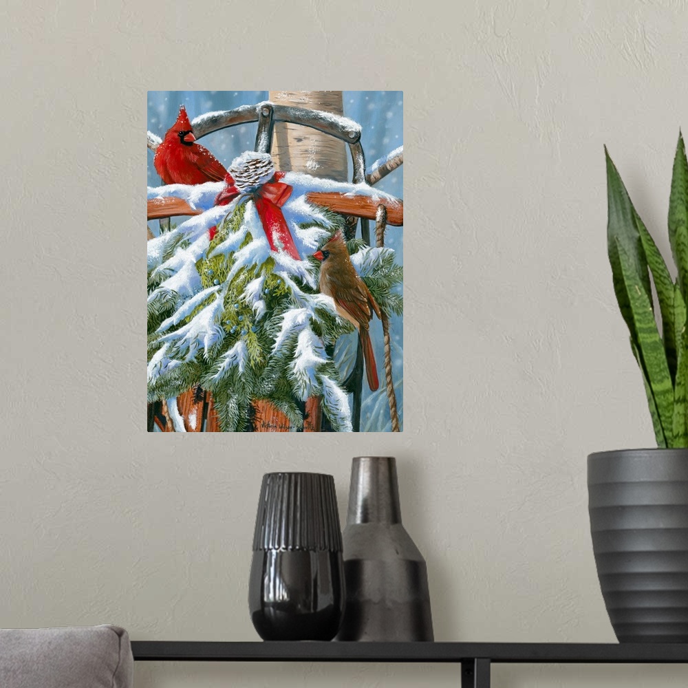A modern room featuring This large artwork piece shows two cardinals standing in a snow covered wreath that covers an old...