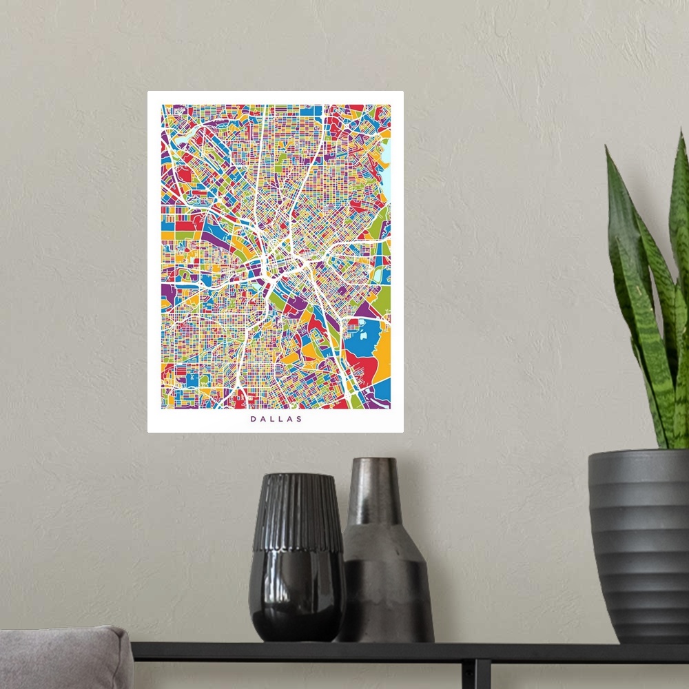 A modern room featuring A street map of Dallas, Texas, United States, with land areas colored green, blue, yellow, red an...