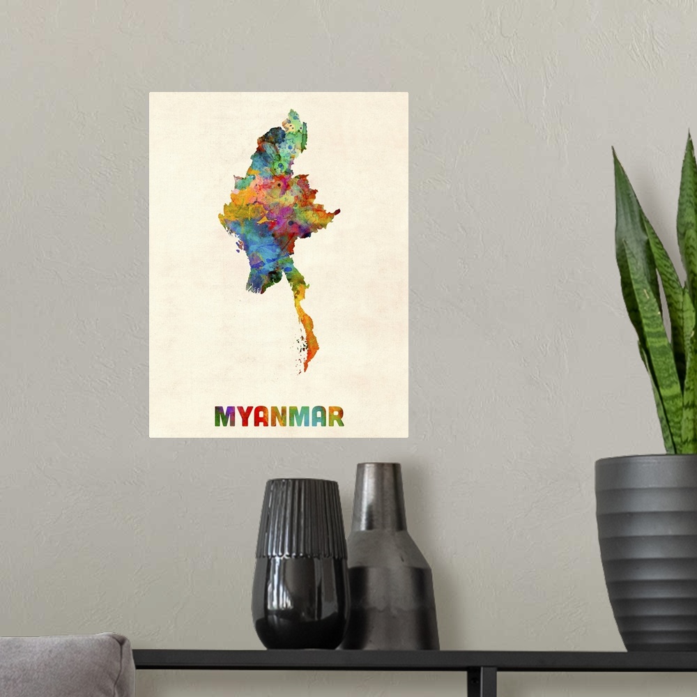 A modern room featuring Colorful watercolor art map of Myanmar against a distressed background.
