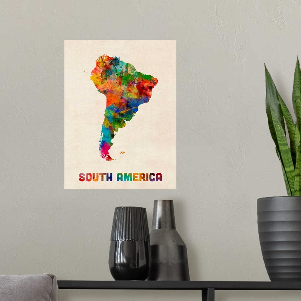 A modern room featuring A watercolor map of South America.