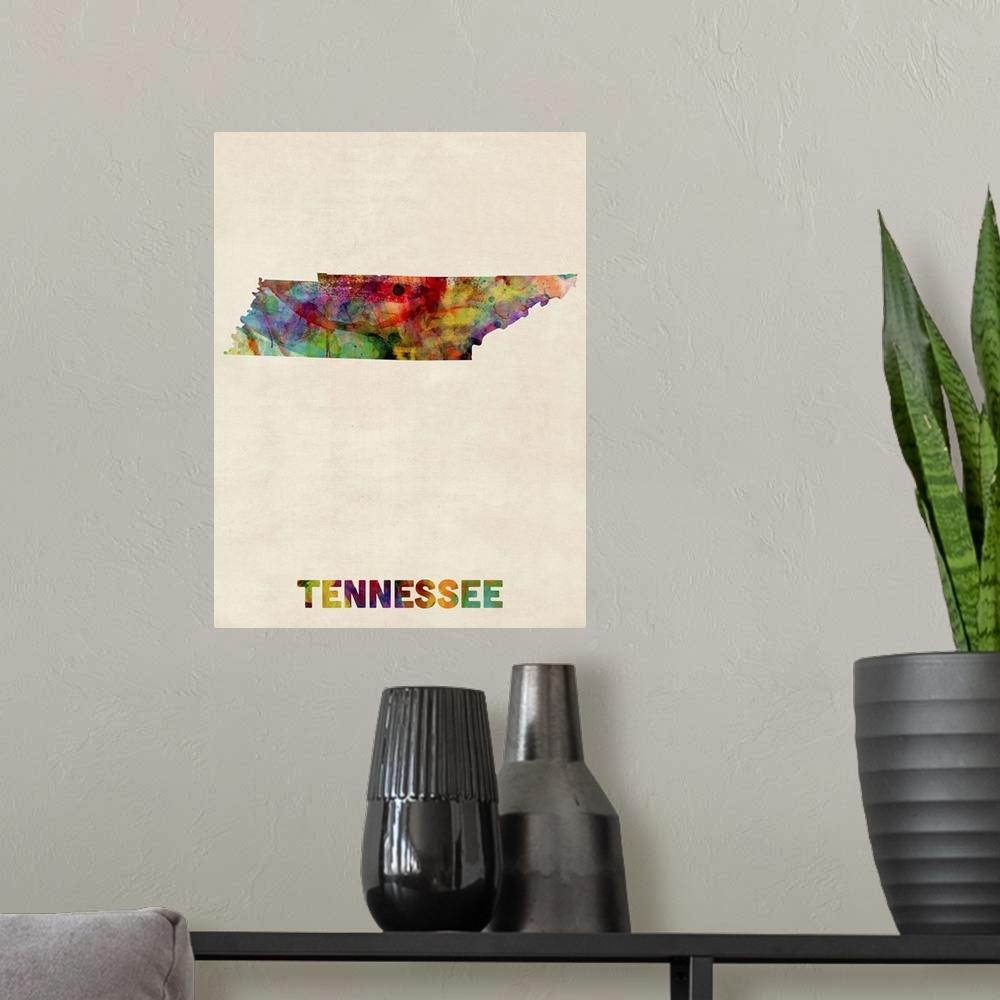 A modern room featuring Contemporary piece of artwork of a map of Tennessee made up of watercolor splashes.