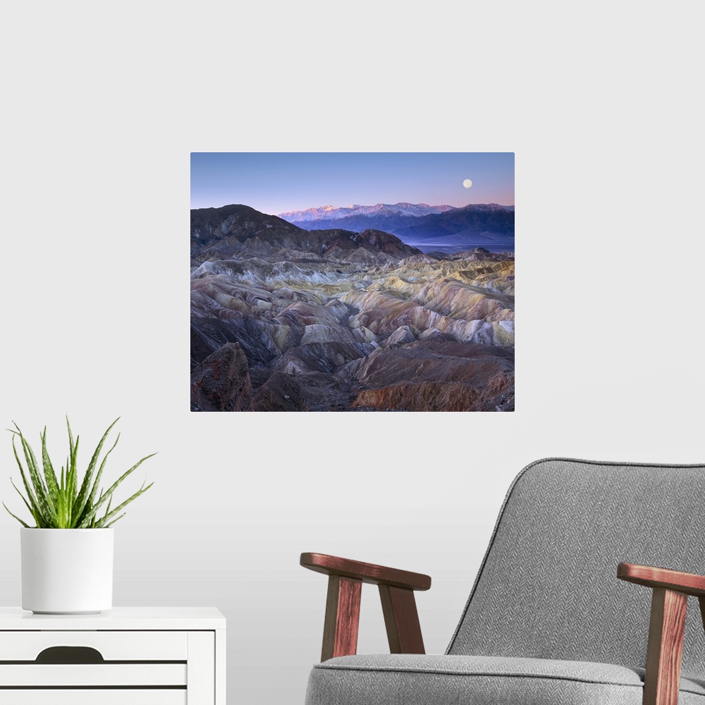 A modern room featuring Full moon rising over Zabriskie Point, Death Valley National Park, California