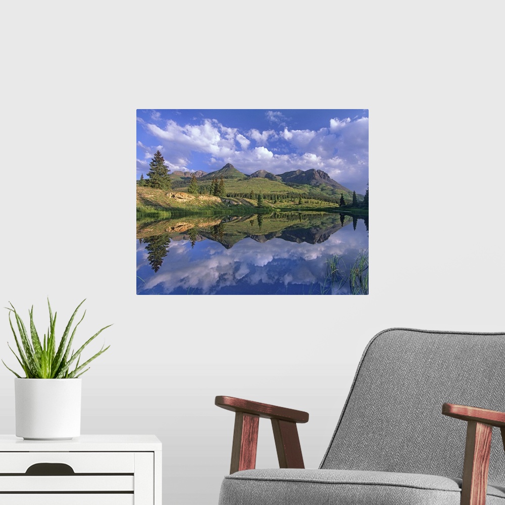 A modern room featuring Grand Turk and Sultan Mountain reflected in Molas Lake, Colorado