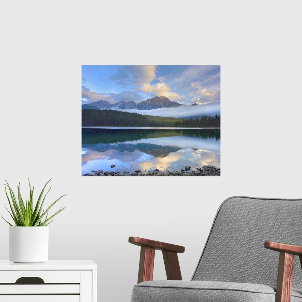 A modern room featuring Pyramid Mountain and forest reflected in Patricia Lake, Jasper National Park, Canada