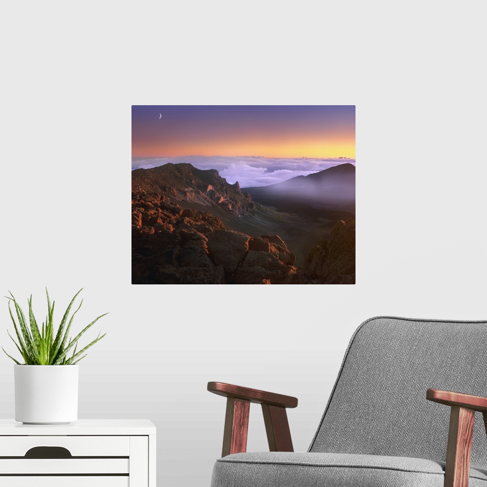 A modern room featuring Sunrise and crescent moon overlooking Haleakala Crater, Maui, Hawaii
