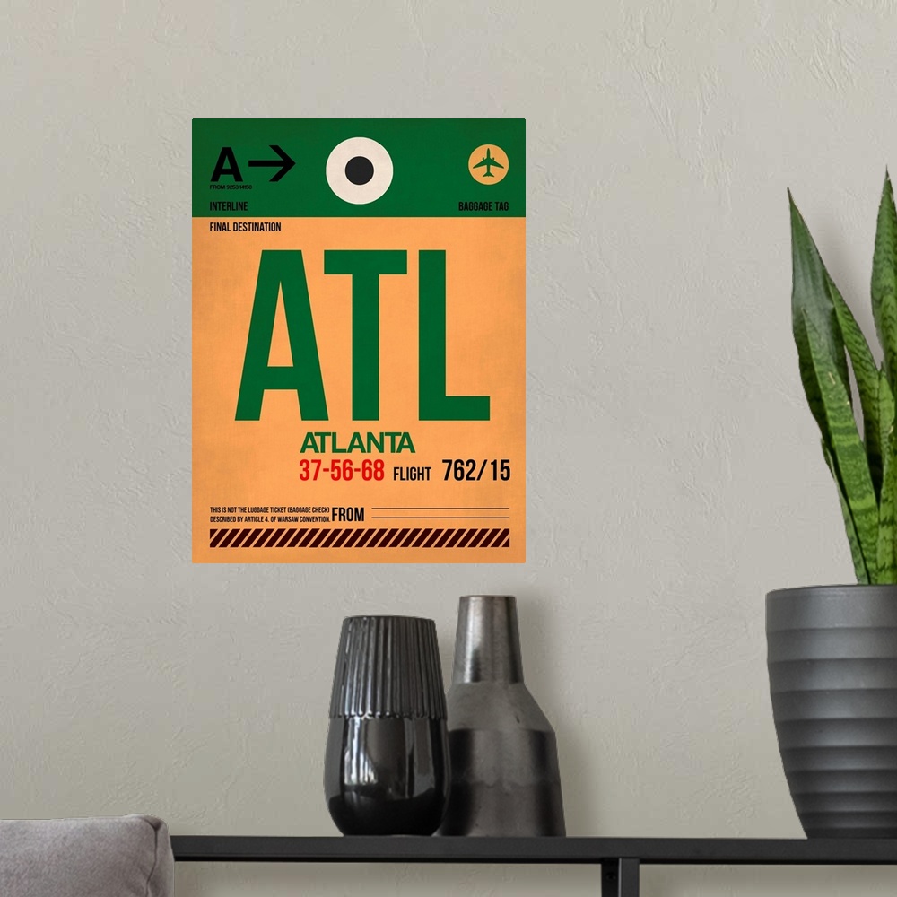 A modern room featuring ATL Atlanta Luggage Tag I