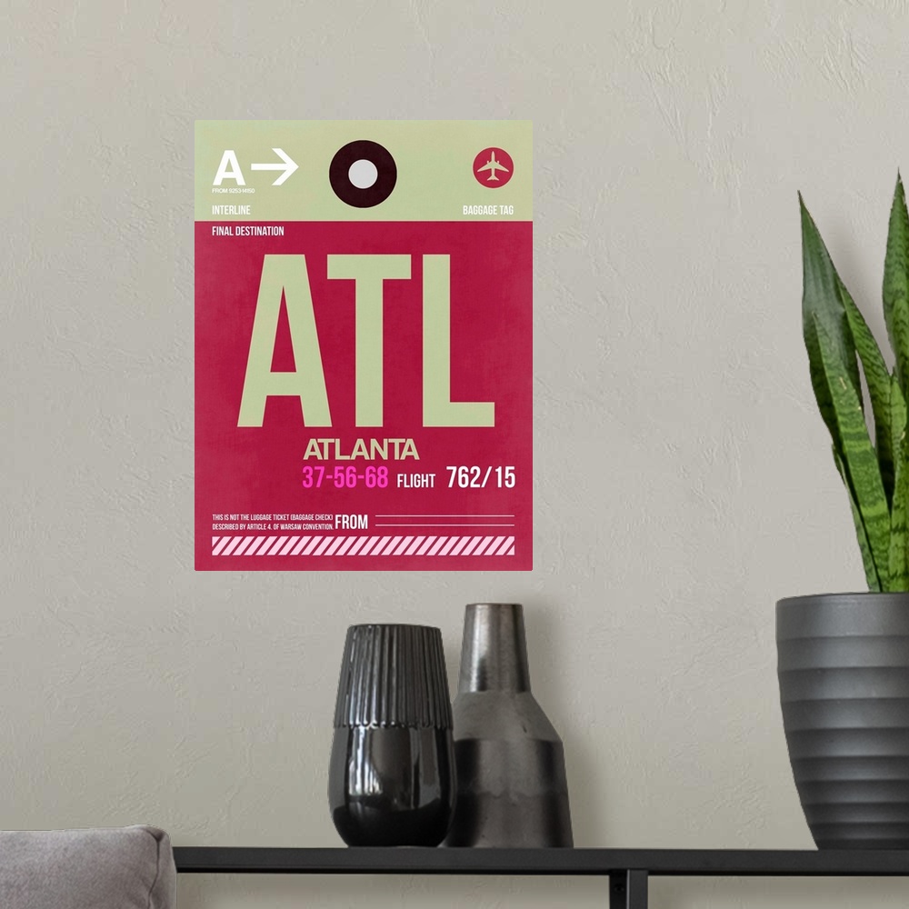 A modern room featuring ATL Atlanta Luggage Tag II