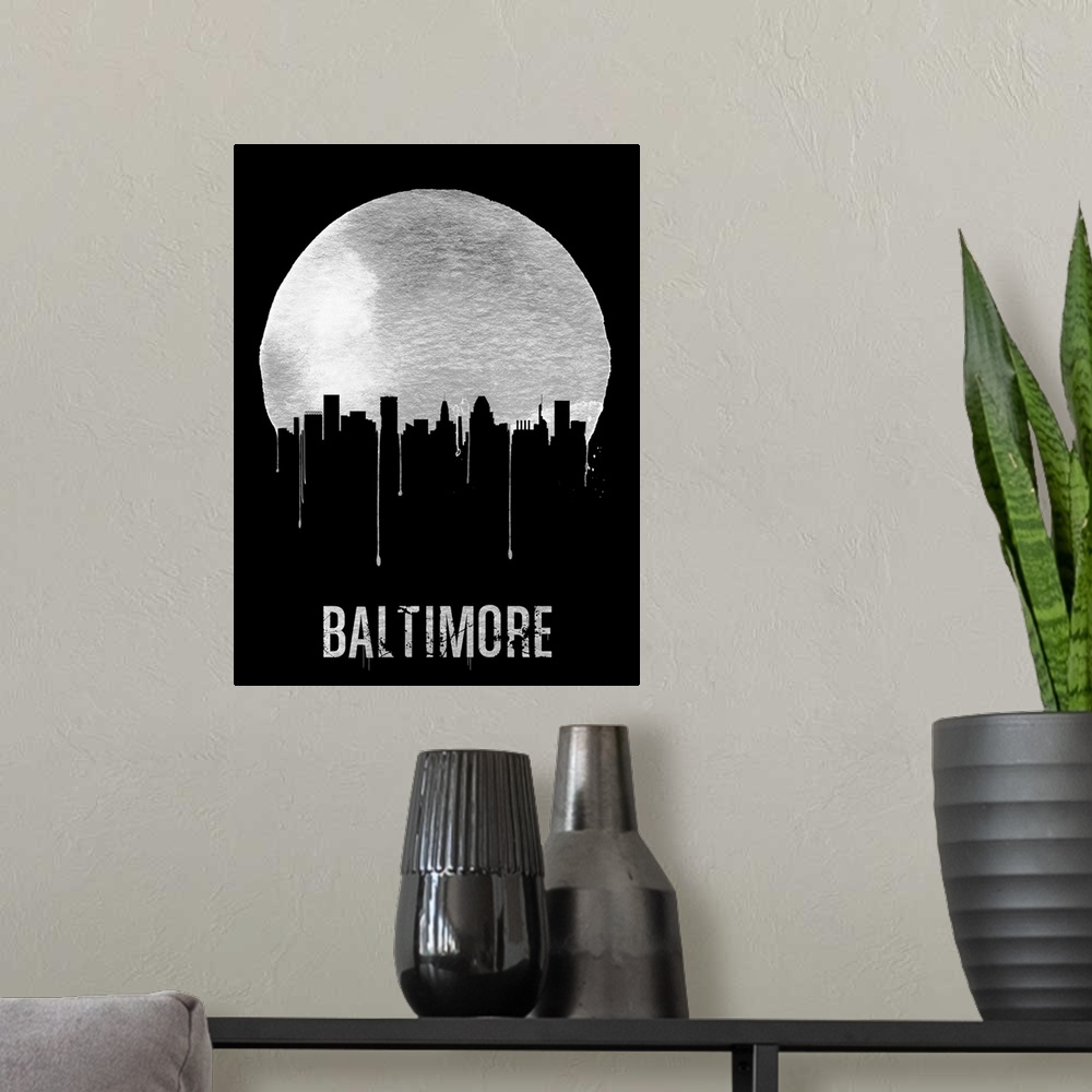 A modern room featuring Contemporary watercolor artwork of the Baltimore city skyline, in silhouette.