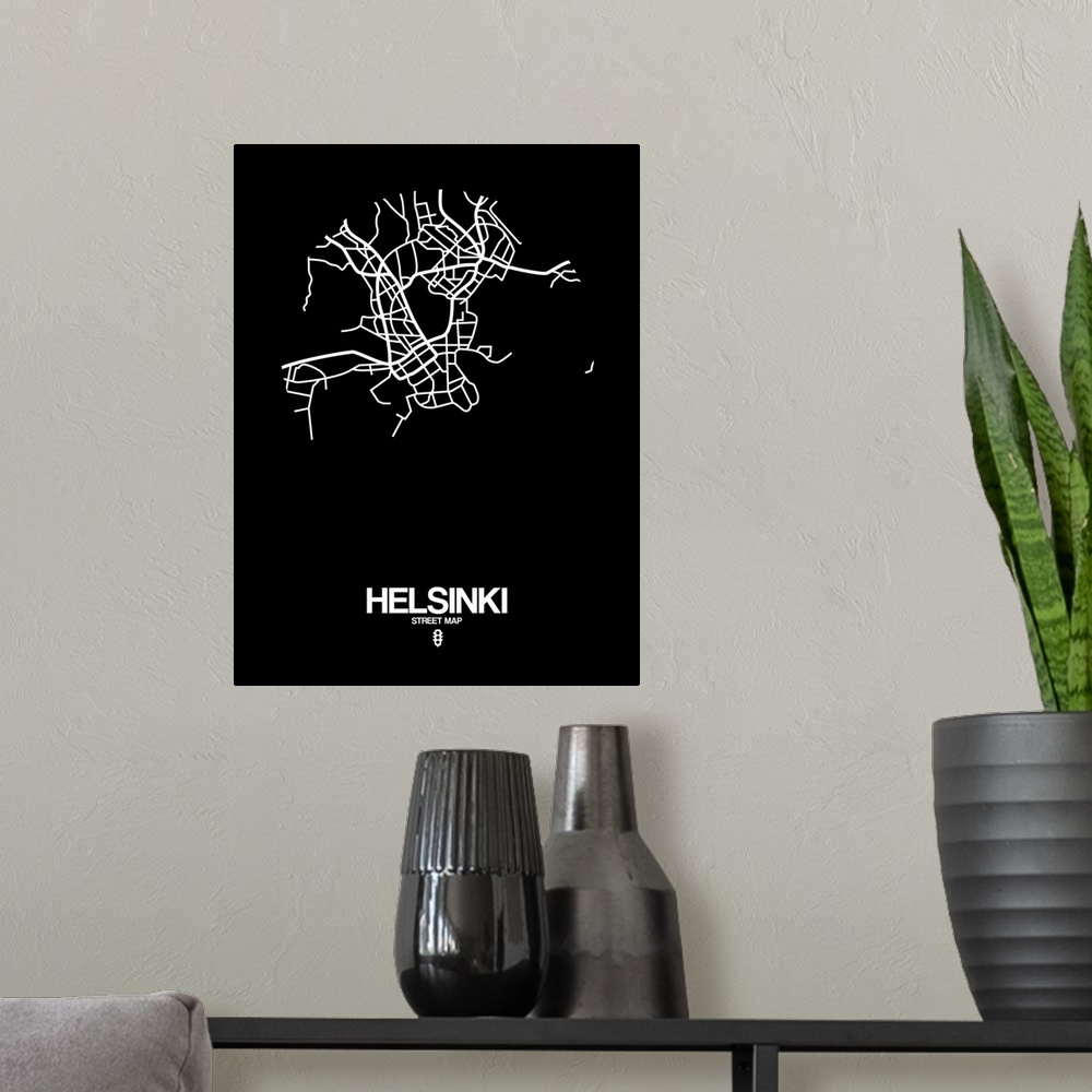 A modern room featuring Minimalist art map of the city streets of Helsinki in black and white.
