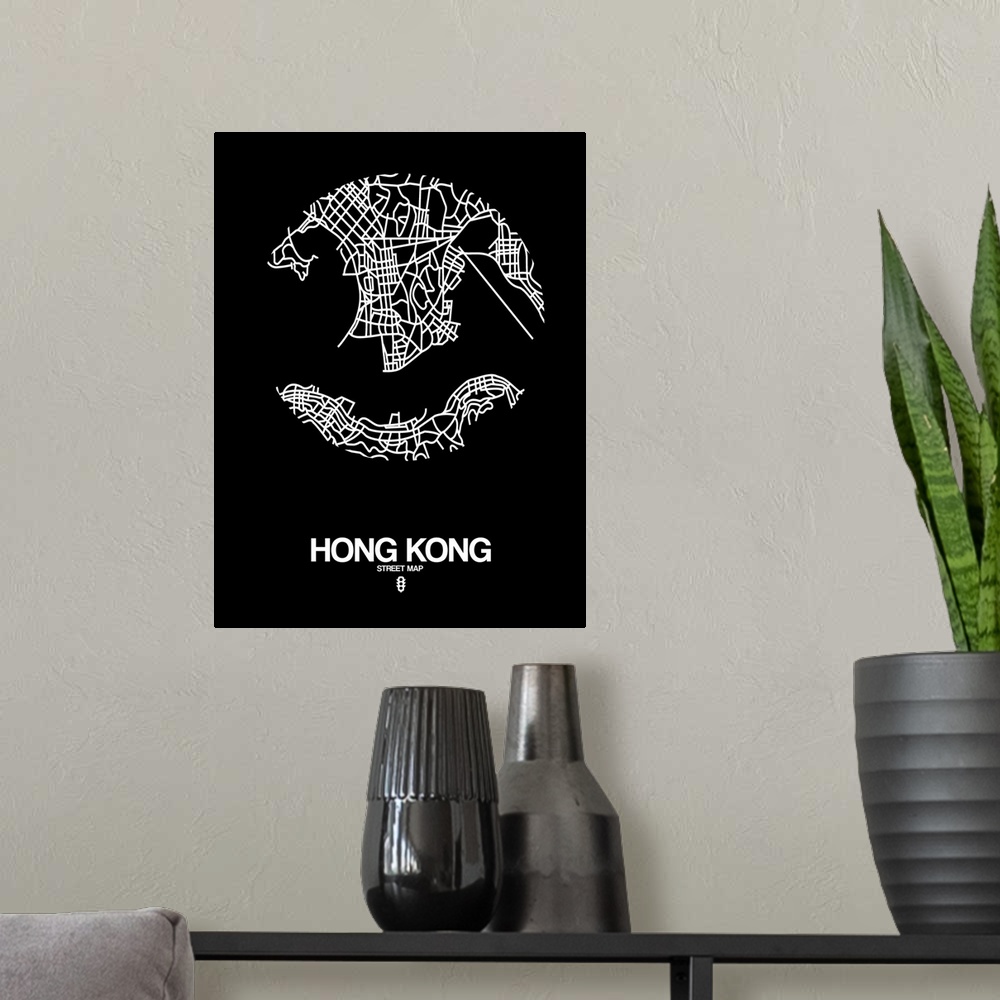 A modern room featuring Minimalist art map of the city streets of Hong Kong in black and white.