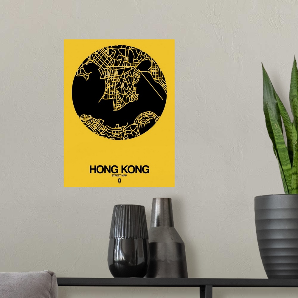 A modern room featuring Minimalist art map of the city streets of Hong Kong in yellow and black.