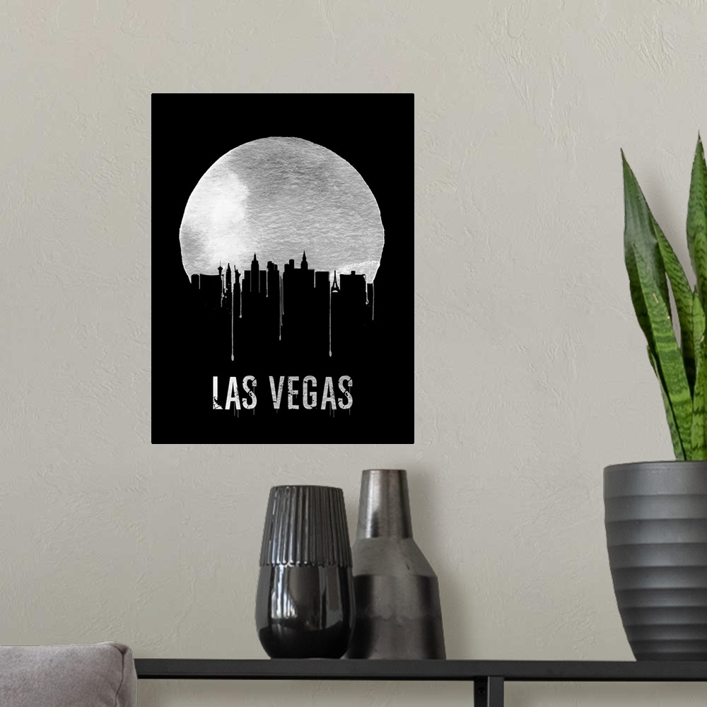 A modern room featuring Contemporary watercolor artwork of the Las Vegas city skyline, in silhouette.