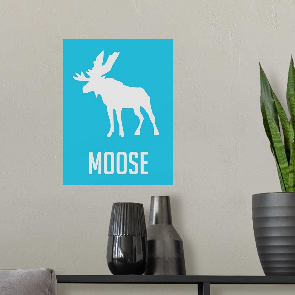 A modern room featuring Minimalist Wildlife Poster - Moose - Blue