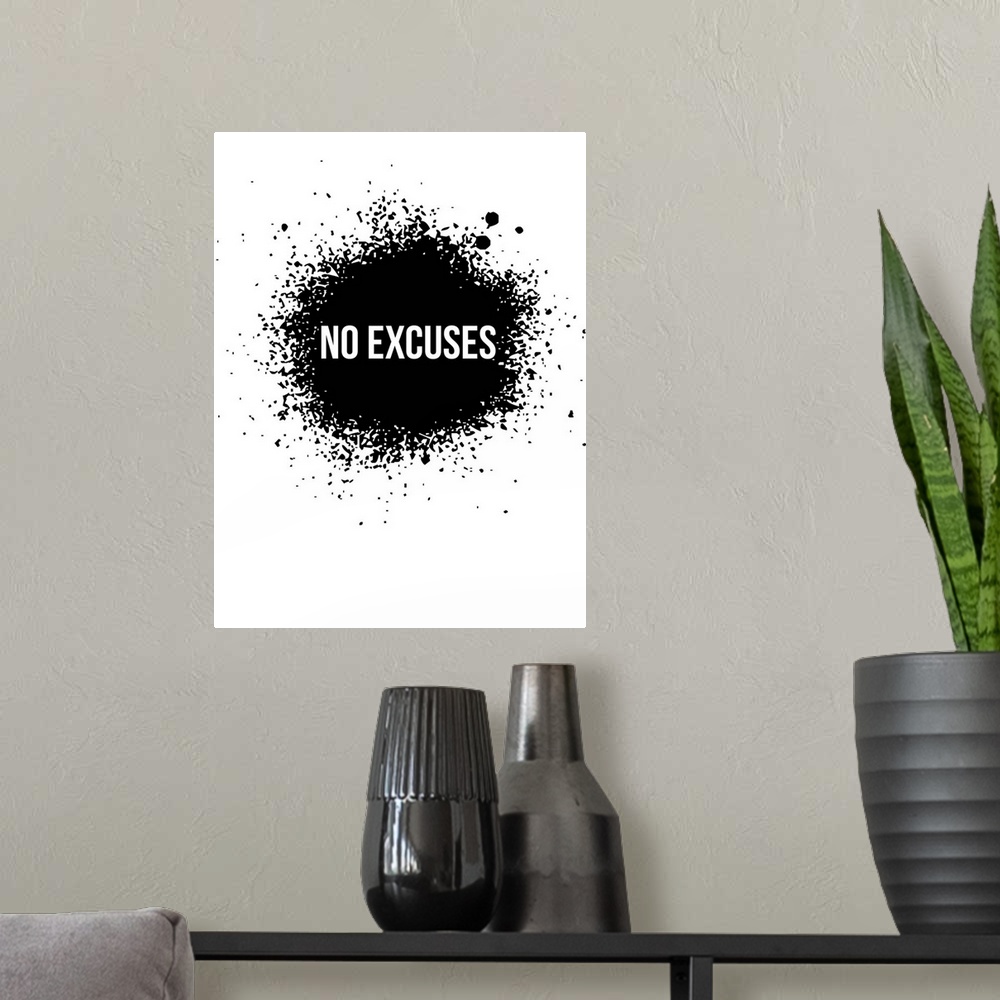 A modern room featuring Typography poster art using high contrast and paint splatter.