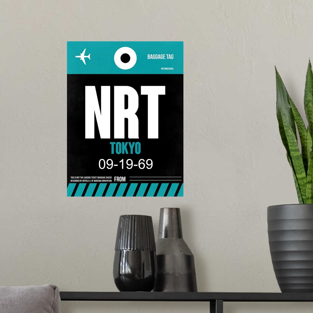 A modern room featuring NRT Tokyo Luggage Tag II