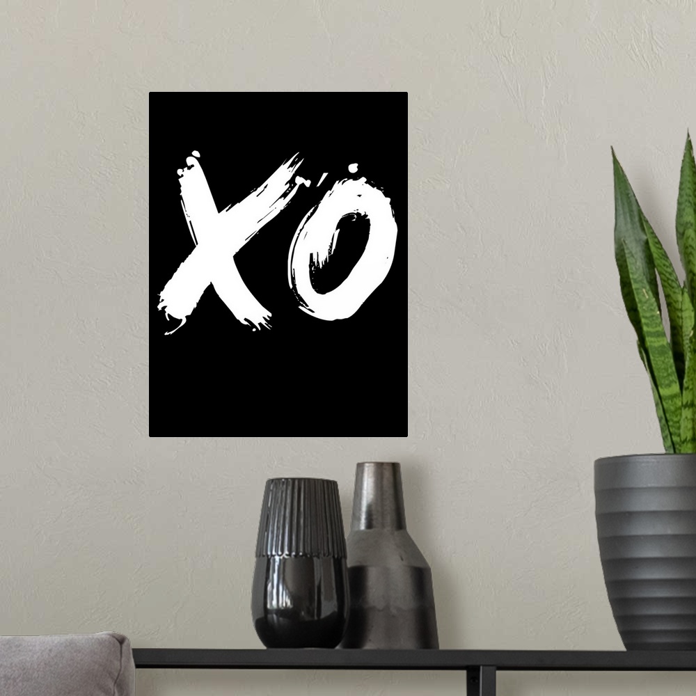 A modern room featuring XO Poster Black