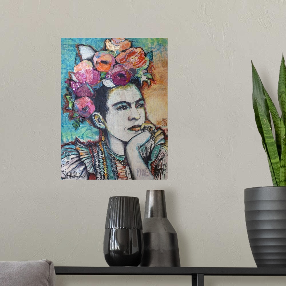 A modern room featuring Frida Kahlo contemplating with side glance and floral headpiece in mixed media.