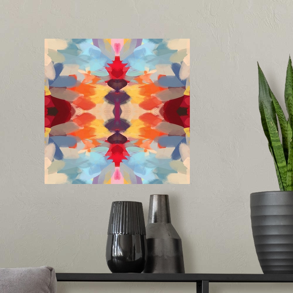 A modern room featuring Kaleidoscopic abstract pattern in shades of red, orange, and blue.