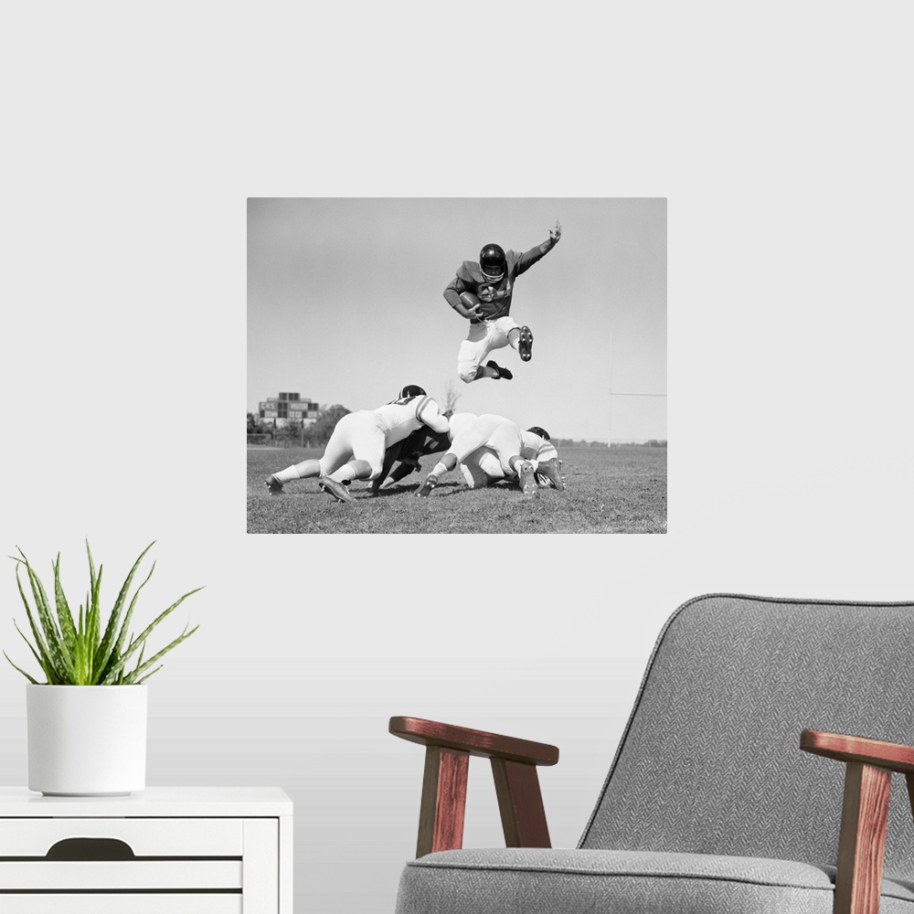 A modern room featuring 1960's Football Player Jumping Over Blocked Players