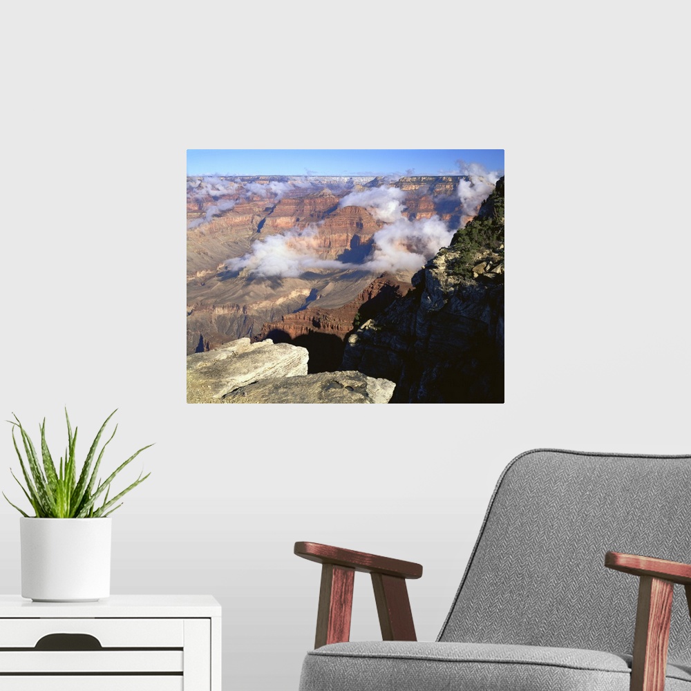 A modern room featuring Arizona, Grand Canyon National Park, Clouds over the terrain