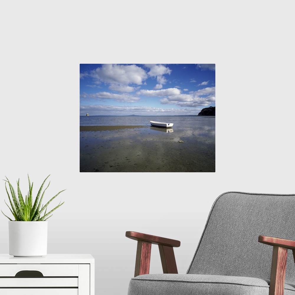 A modern room featuring Dinghy on the beach, Auckland, New Zealand