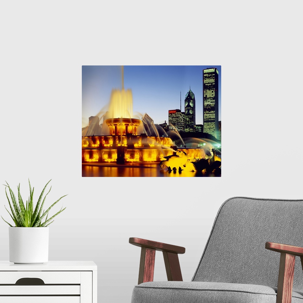 A modern room featuring Fountain in a city lit up at dusk, Chicago, Illinois