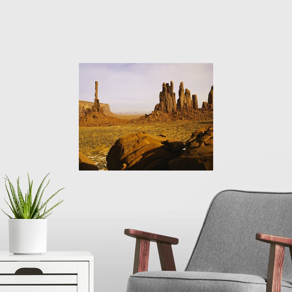 A modern room featuring Rock formations on a landscape, Totem Pole Rock, Yei Bi Chei, Monument Valley Tribal Park, Arizona
